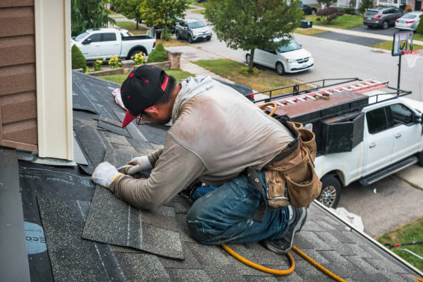 Professional Roofing technician working in Trail, OR